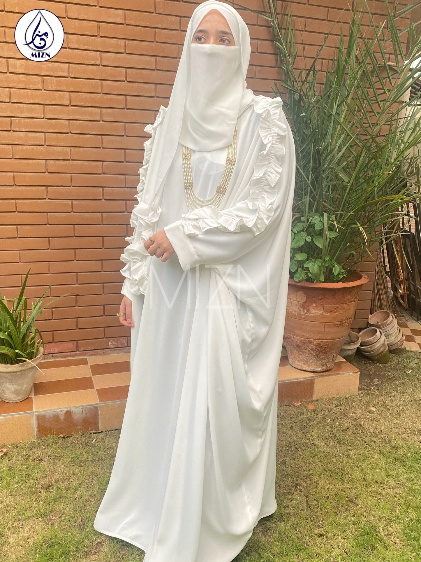 DIVINE with hijab